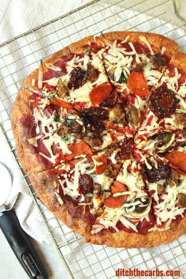 This is THE Fat Head pizza recipe, and it just got better - now with it's own quick cooking video. This is Google's number one low carb and keto pizza. Grain free, gluten free, wheat free heaven. | ditchthecarbs.com
